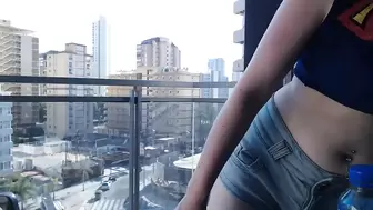 Supergirl Clothed flashing boobies in balcony