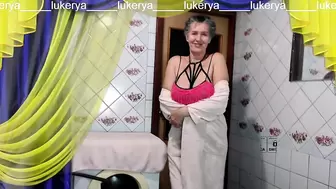 Morning of the newly awakened Lukerya. He takes off his bathrobe in the kitchen and starts a fun flirting on the online camera