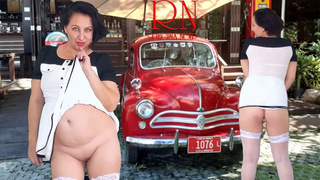 Double Regina Noir. A gorgeous whore in a short dress shows a striptease. Cunt and butt. Car one